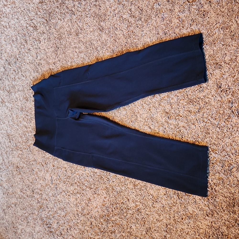 Yogalicious Lux Leggings with side pockets dark teal/green in color